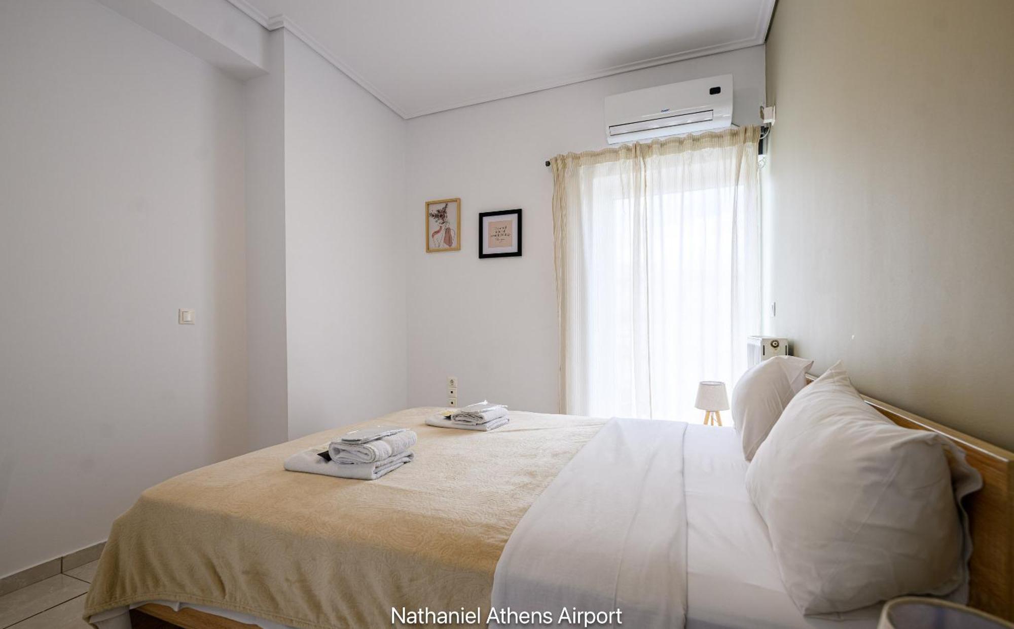 Nathaniel Athens Airport Spáta Buitenkant foto